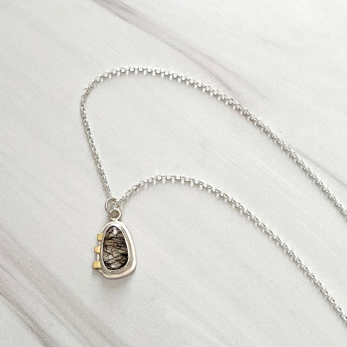 Black tourmalinated quartz necklace with 18k gold accent