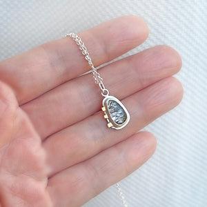 Uncommon small black tourmalinated gemstone pendant necklace