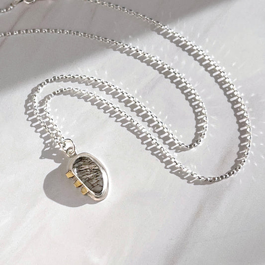 Black tourmalinated quartz necklace with 18k gold accent