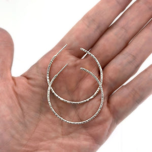 Large silver hoop post earrings