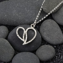 Textured silver heart pendant necklace