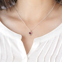 Small round silver and 14k gold garnet necklace