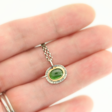Oval Green Tourmaline Pendant Necklace in 14k yellow gold and silver