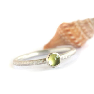 Silver and round peridot stacking ring
